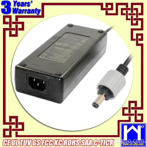 24V 5amp AC adapter with 5.5mm/2.1mm DC connector and ferrite ring on the cable